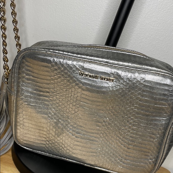 Victoria's Secret Handbags - Victoria's Secret Metallic Silver Cosmetic Bag